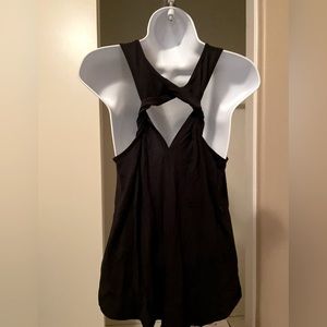 Tart super soft workout or casual top with open back. Black size small.